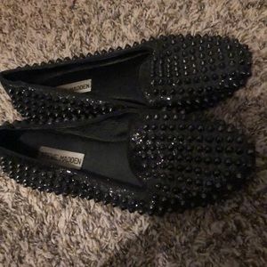 Black spiked flats